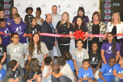 Big Brothers, Big Sisters join forces with districts to provide meaningful mentoring Lemoore Mayor Ray Madrigal cuts the ribbon Thursday, March 16, in the Lemoore Elementary School Cafeteria, to inaugurate the Big Brothers, Big Sisters "Bigs" program between the Lemoore High and Lemoore Elementary districts.